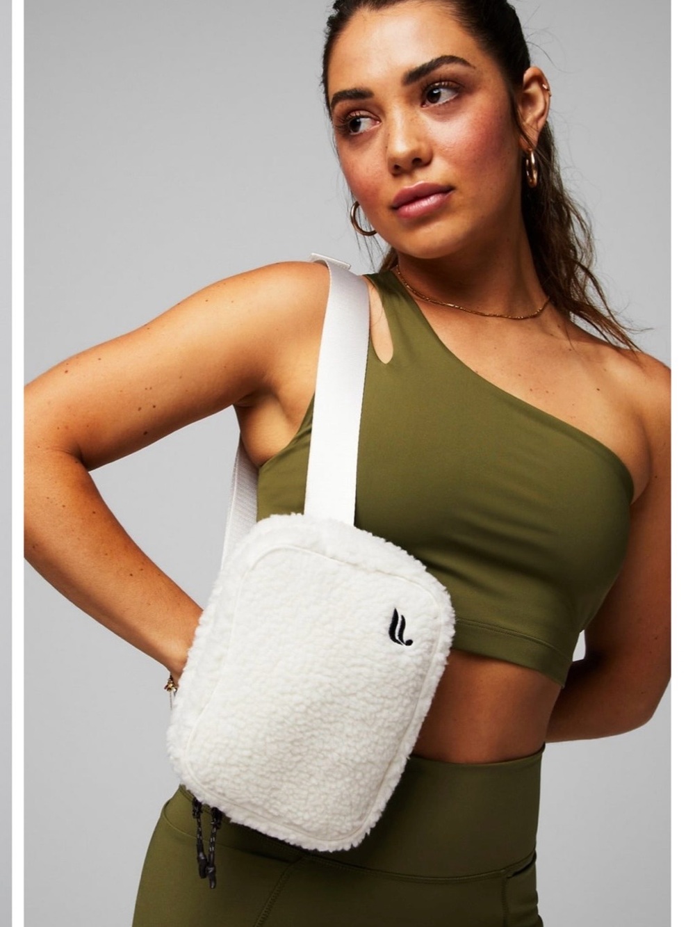 Fabletics The Belt Bag Teddy in color Bone Sherpa Crossbody Bag with Wide Strap
